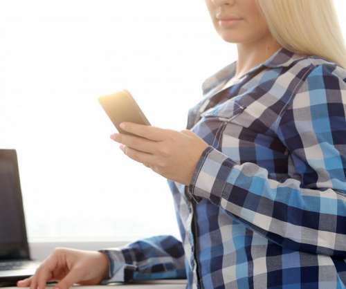Woman using a mobile smart phone