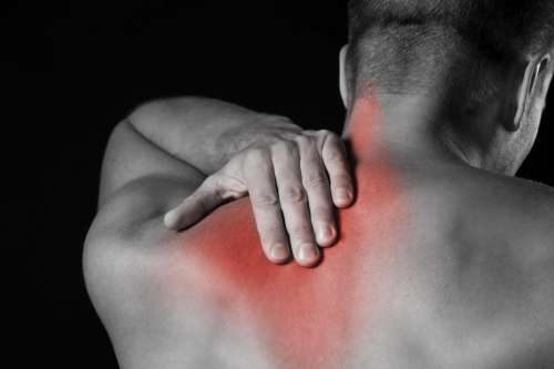 Man with shoulder and upper back pain