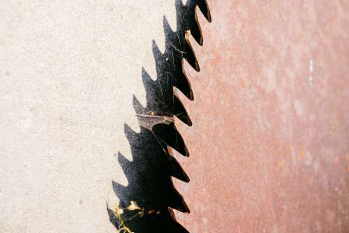 Old rusty saw blade closeup