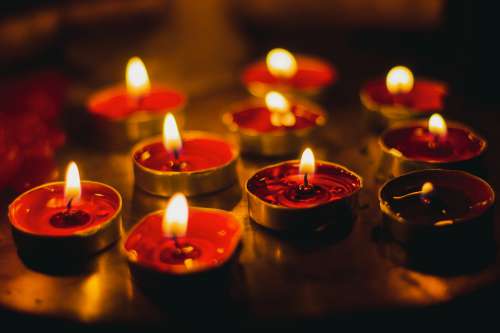Red Tealights Arranged For Diwali Photo
