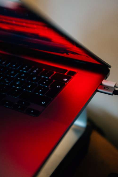 Laptop Details In Red Light Photo