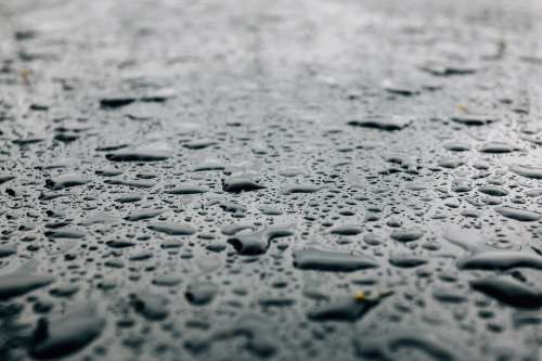 Smooth Surface With Droplets of Water Photo