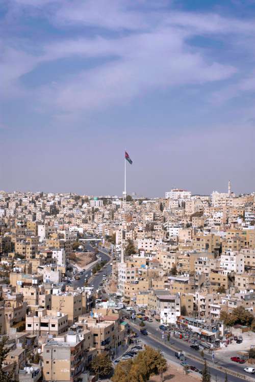 National Flag Of Jordan Over City Of Jerash Photo
