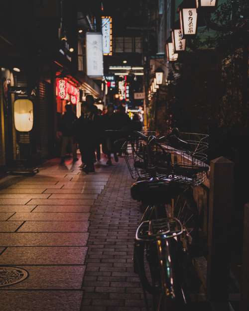 Lights Shine Over Shadowy Streets Photo