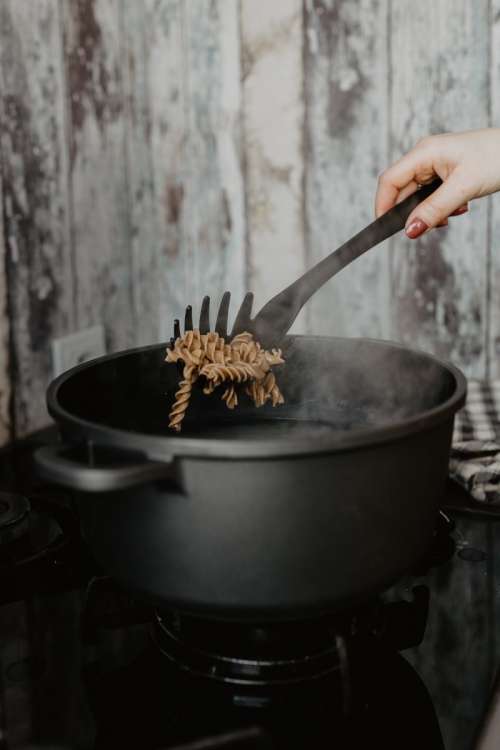 Pasta penne in a boiling water