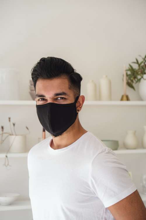 Smiling Man In Black Cloth Face Mask Photo