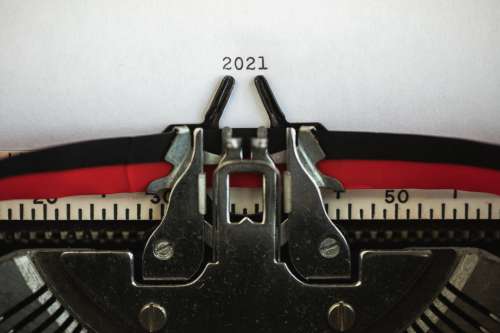 Typewriter Holds Papers With The Numbers 2021 Photo