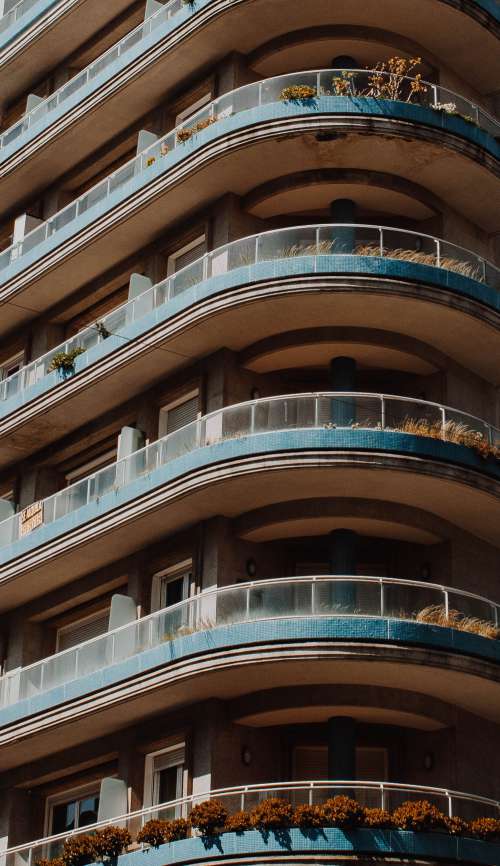 Tall Building With Window Planters Photo