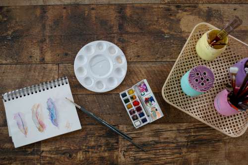 Wooden Craft Table Set Up For Watercolors Photo