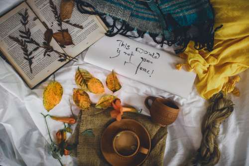 Textured Flat Lay With Coffee And Books Photo