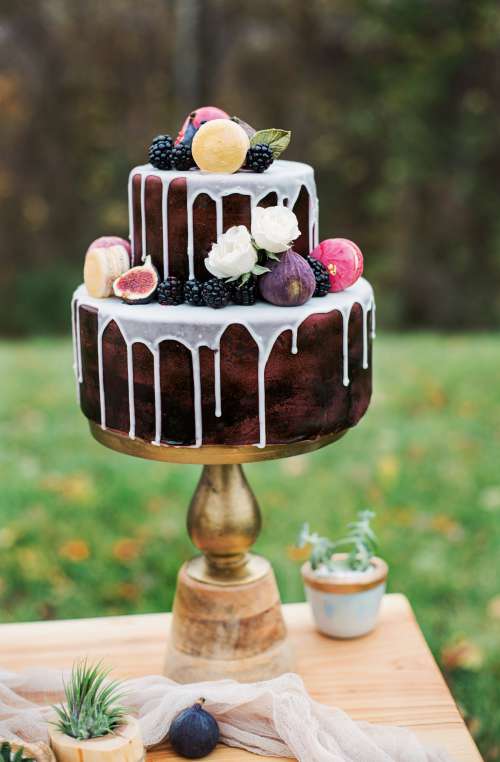 A Decadent Cake At Outdoor Celebration Photo