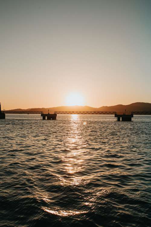 Sunset Over An Industrial Bridge Photo