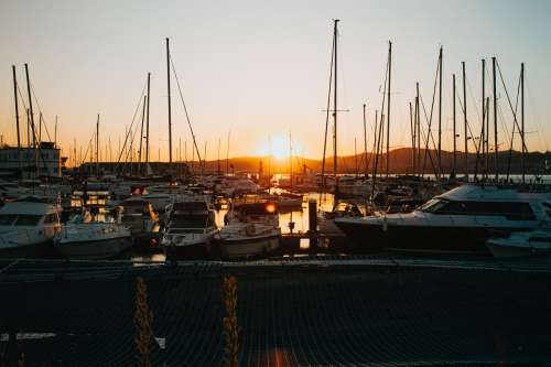 Sunsets In A Marina Full Of Boats Photo
