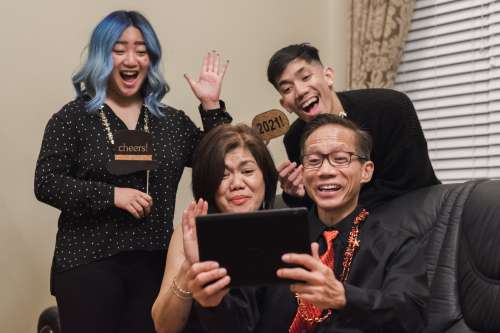 Video Calling Family And Friends At New Year Photo