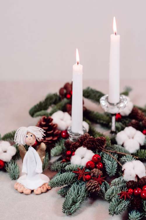 Christmas spruce decoration with candles and an angel 2