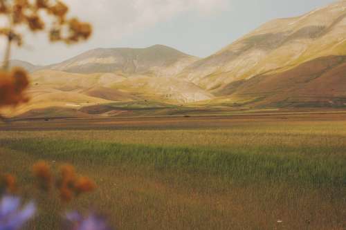 Beautiful Landscape Of Soft Pastel Grassy Hills Photo