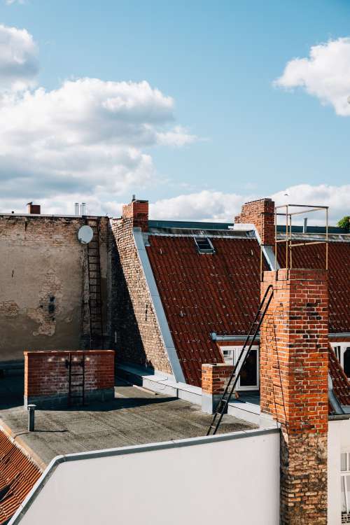 Roof Top With Red Brick On Clear Day Photo