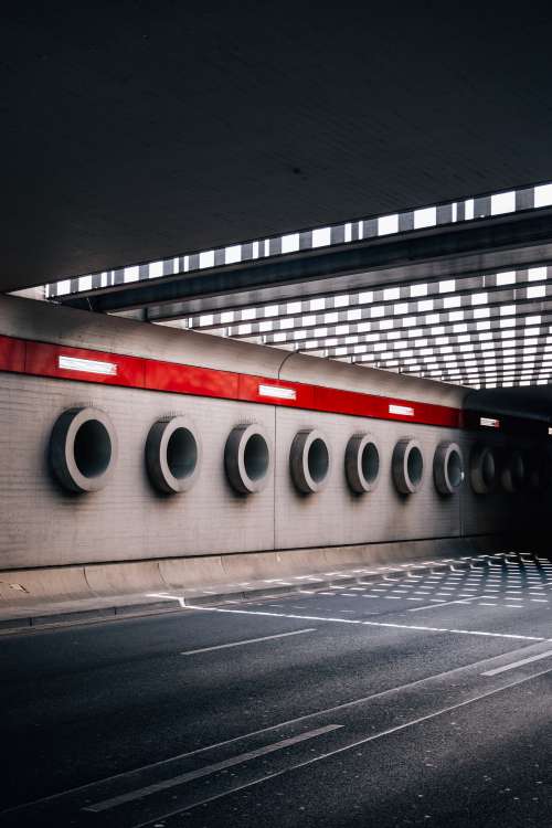 Cement Circles Line The Wall Under An Overpass Photo