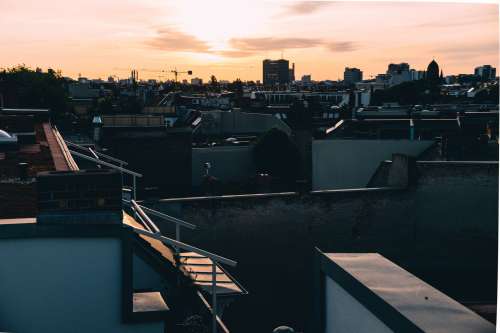 Roof Tops At Sunset In An Industrial Setting Photo
