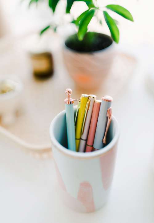 Pink Cup Full Of Pens Photo