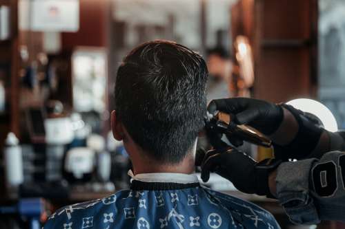 Customer Getting Hair Trimmed Photo