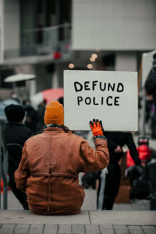 Sign Saying Defund The Police Photo
