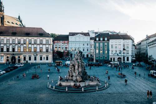 Town Square With A Large Stone Sculpture In The Center Photo