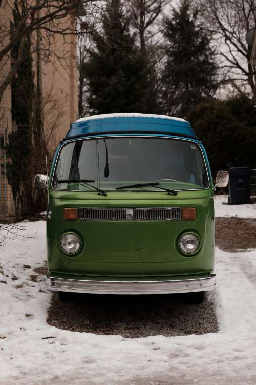 Front View Of A Vintage Camper Van Parked Photo