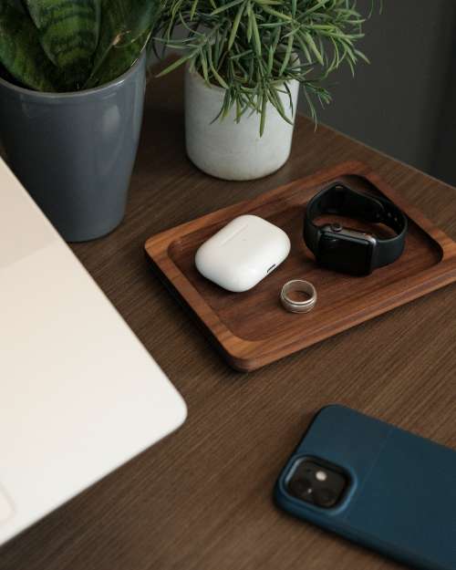 Office Flat Lay On Wooden Desk With Catch Tray Photo