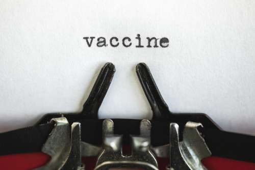 The Words Vaccine On A Typewriter Photo