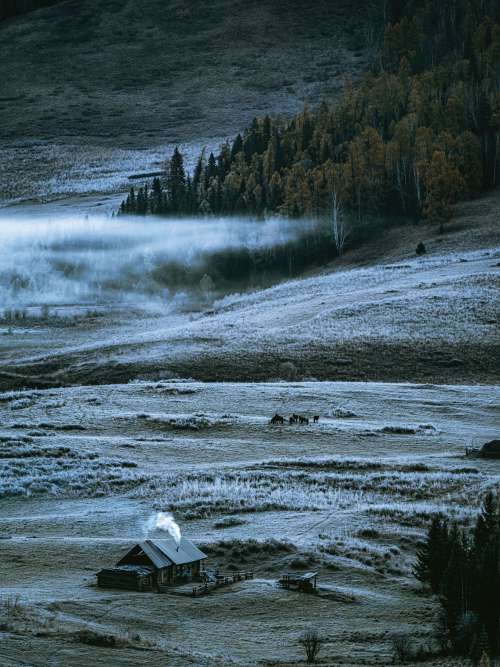 Small Home On A Frost Covered Hill Photo