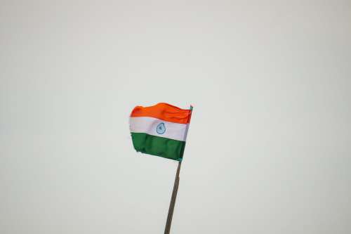 India Flag Against An Overcast Sky Photo