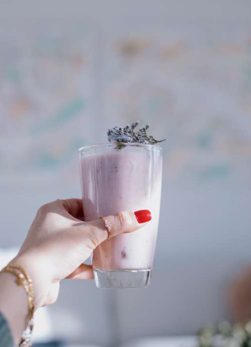 Tall Glass Of A Thick Pink Smoothie Photo