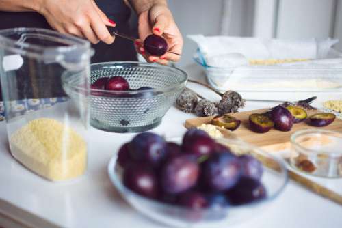 Preparing plums for baking