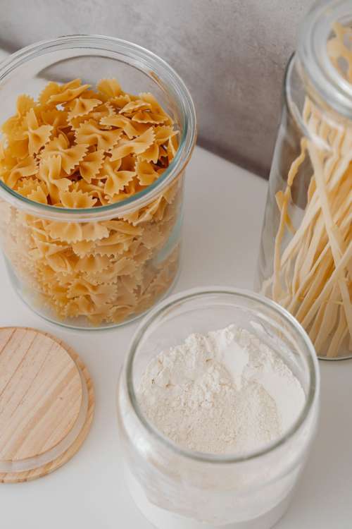 Eco-friendly kitchen utensils and food in jars