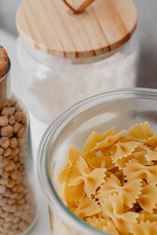 Eco-friendly kitchen utensils and food in jars