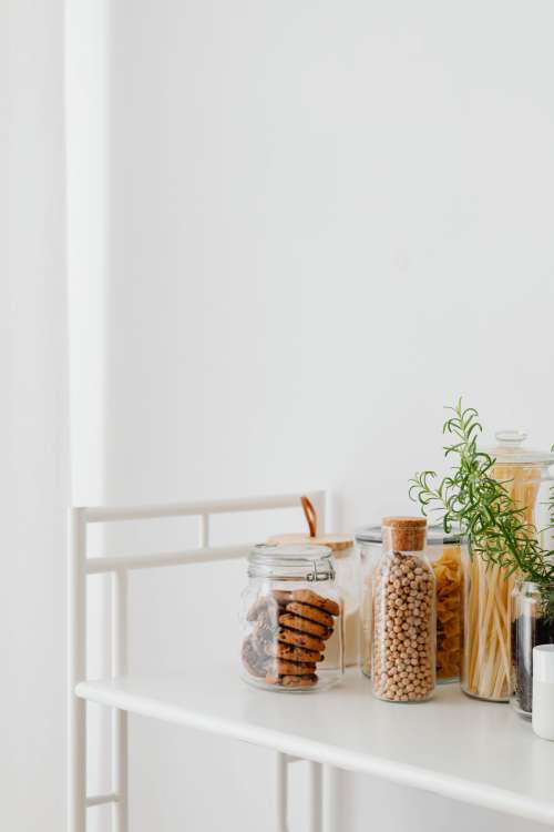 Eco-friendly kitchen utensils and food in jars