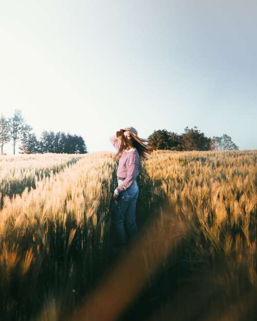 Girl in wheat fields