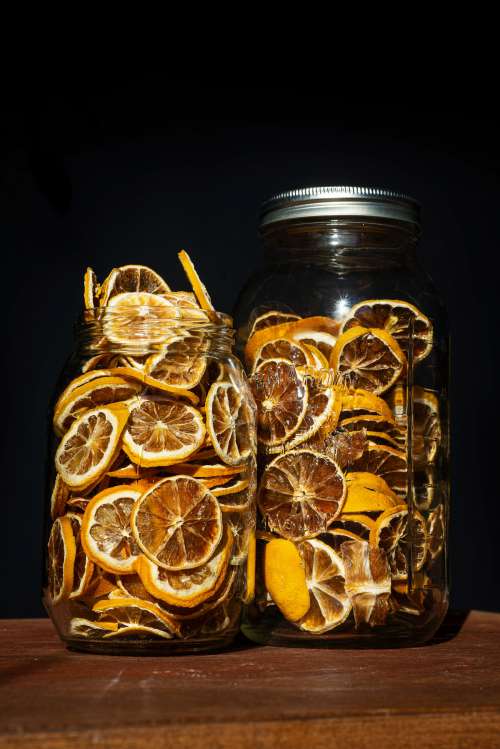 Two Large Jars Of Dried Lemon Slices Photo