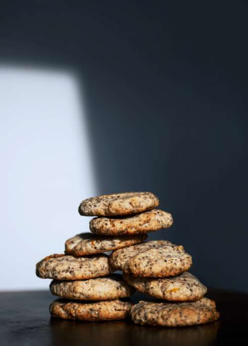 Cookie Towers Stacked On A Wooden Table Photo