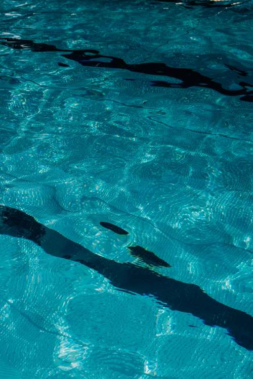 Wavy Water Creating Pattern In Swimming Pool Photo