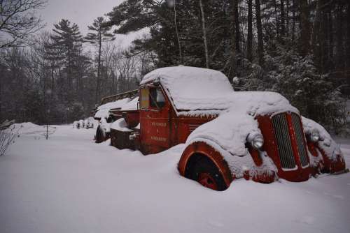 Falling Snow Covers Abandoned Vintage Truck Photo