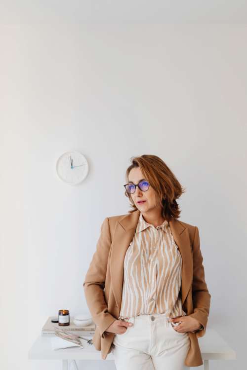 A woman works at her desk - home office