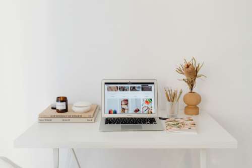 A woman works at her desk - home office