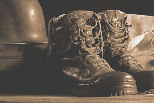 Faded Image Of Combat Boots
