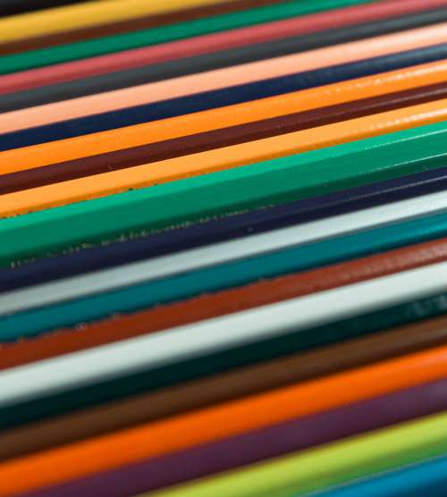 Close Up Of Colored Pencils Lined Up Photo