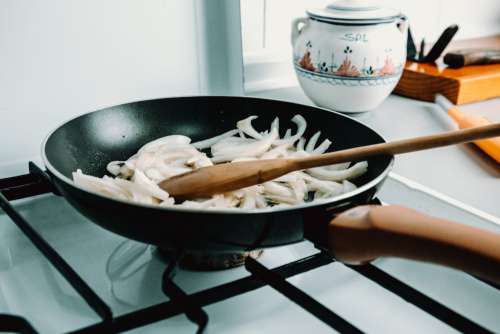 White Onions Being Saved In A Frying Pan Photo