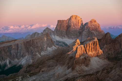 The Sun Rises And Paints The Hills In Warm Light Photo