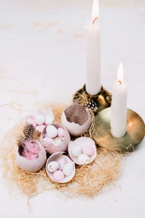 Egg shells Easter table decoration with candles