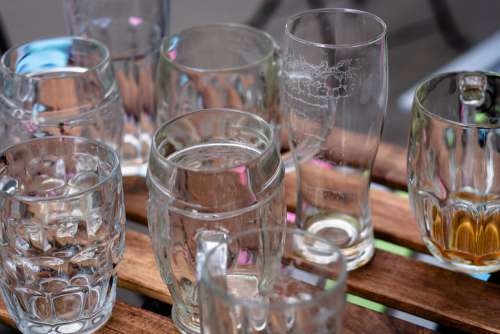 Empty beer glasses on an outdoor table